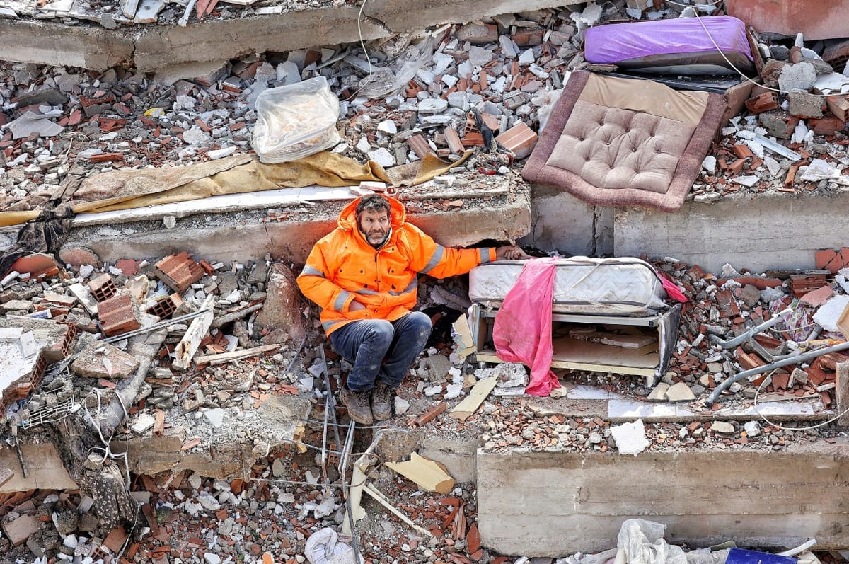 turkey dad daughter hand rubble earthquake