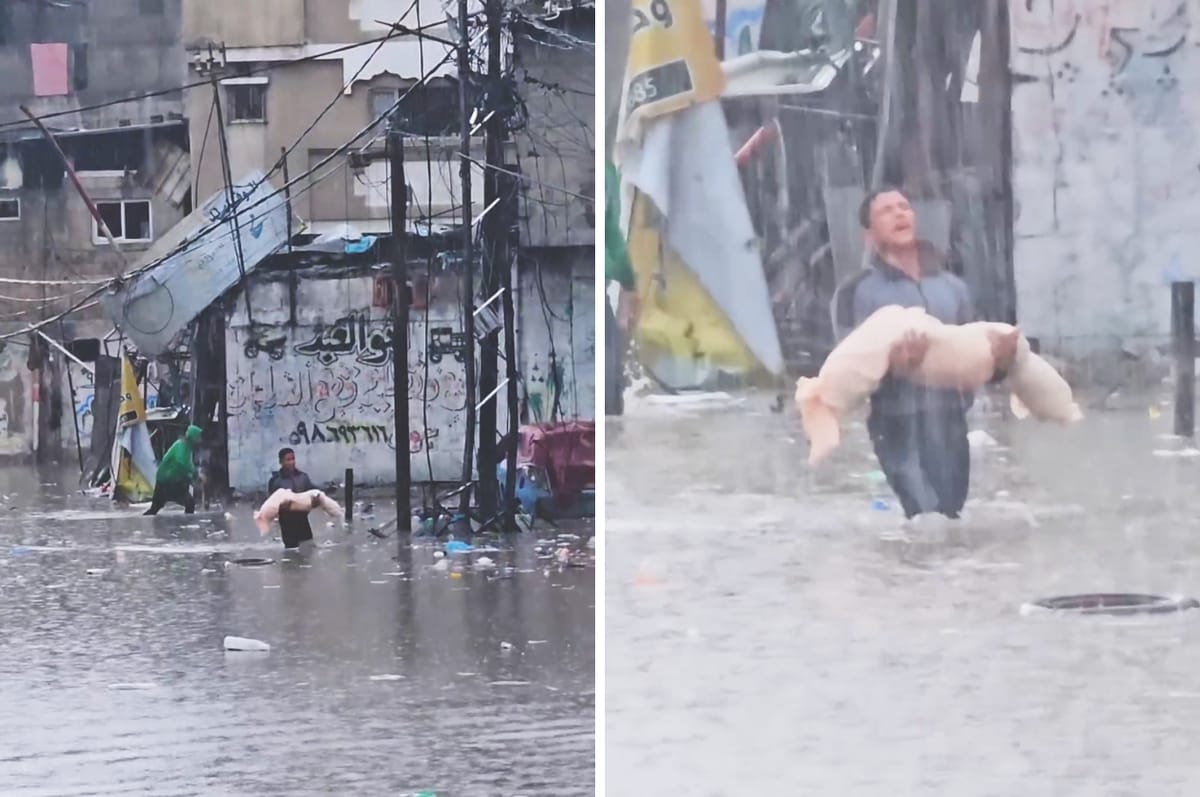 This Young Man Carried The Body Of A Child As Heavy Rain Flooded The Streets Refugee Camps In Gaza