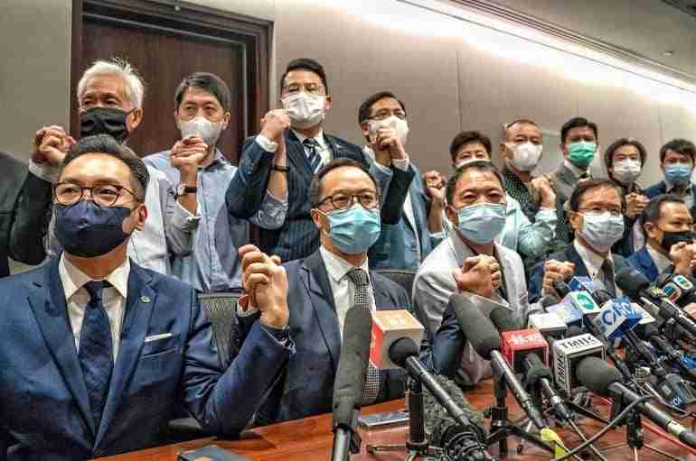 hong kong pro democracy lawmakers quit thumbnail