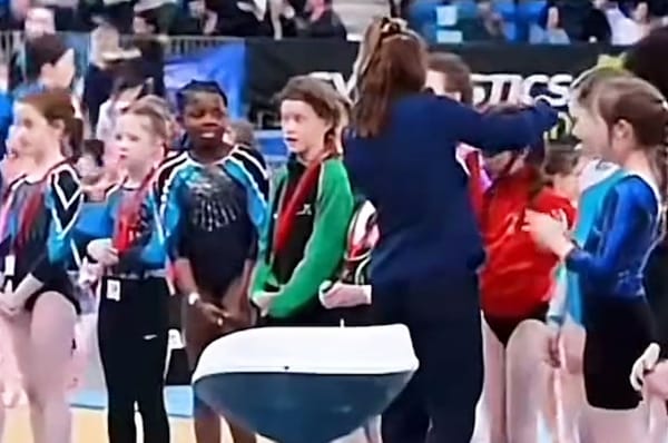 ireland gymnastics black girl medal skipped apology
